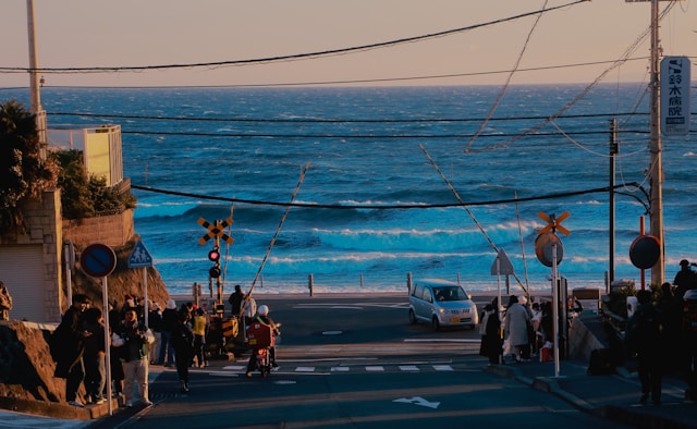 Sunset over Kamakura with Enoden train passing a shrine